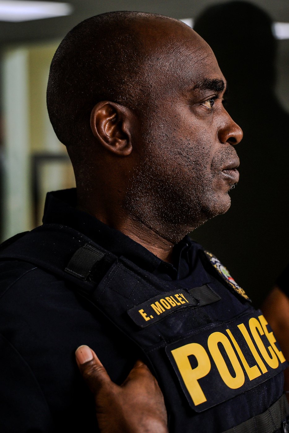 A Pembroke Park police officer looks on during a community event.
